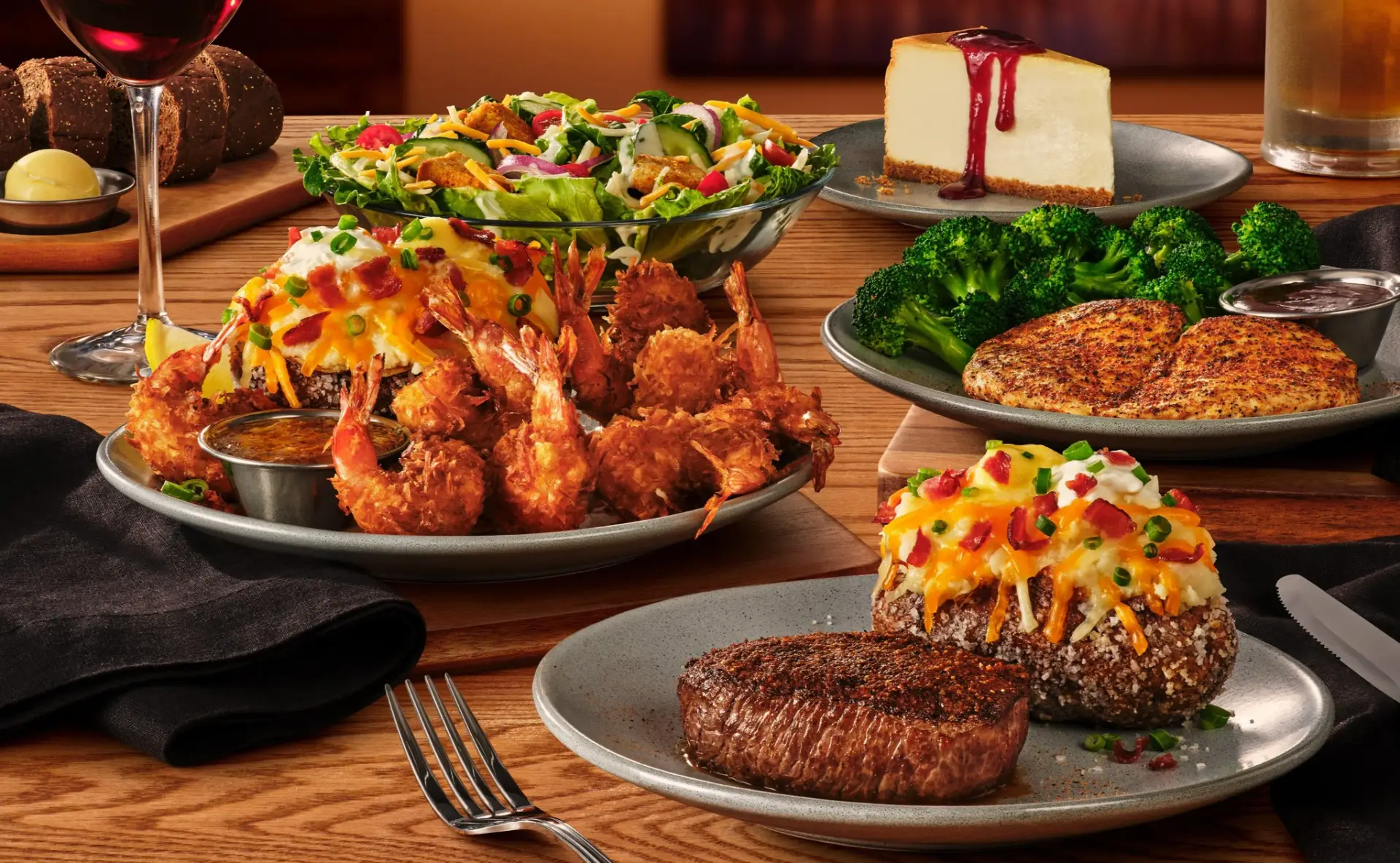 Cheesecake, Grilled Shrimp, Loaded Potato, Lettuce Wedge and Steak.
