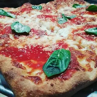 MARGHERITA PIZZA. Fresh mozzarella, fresh basil & homemade tomato sauce.