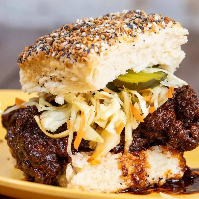 John Lewis Biscuit , Hand-crafted hot chicken, house-made slaw, and Very Spicy pickle.