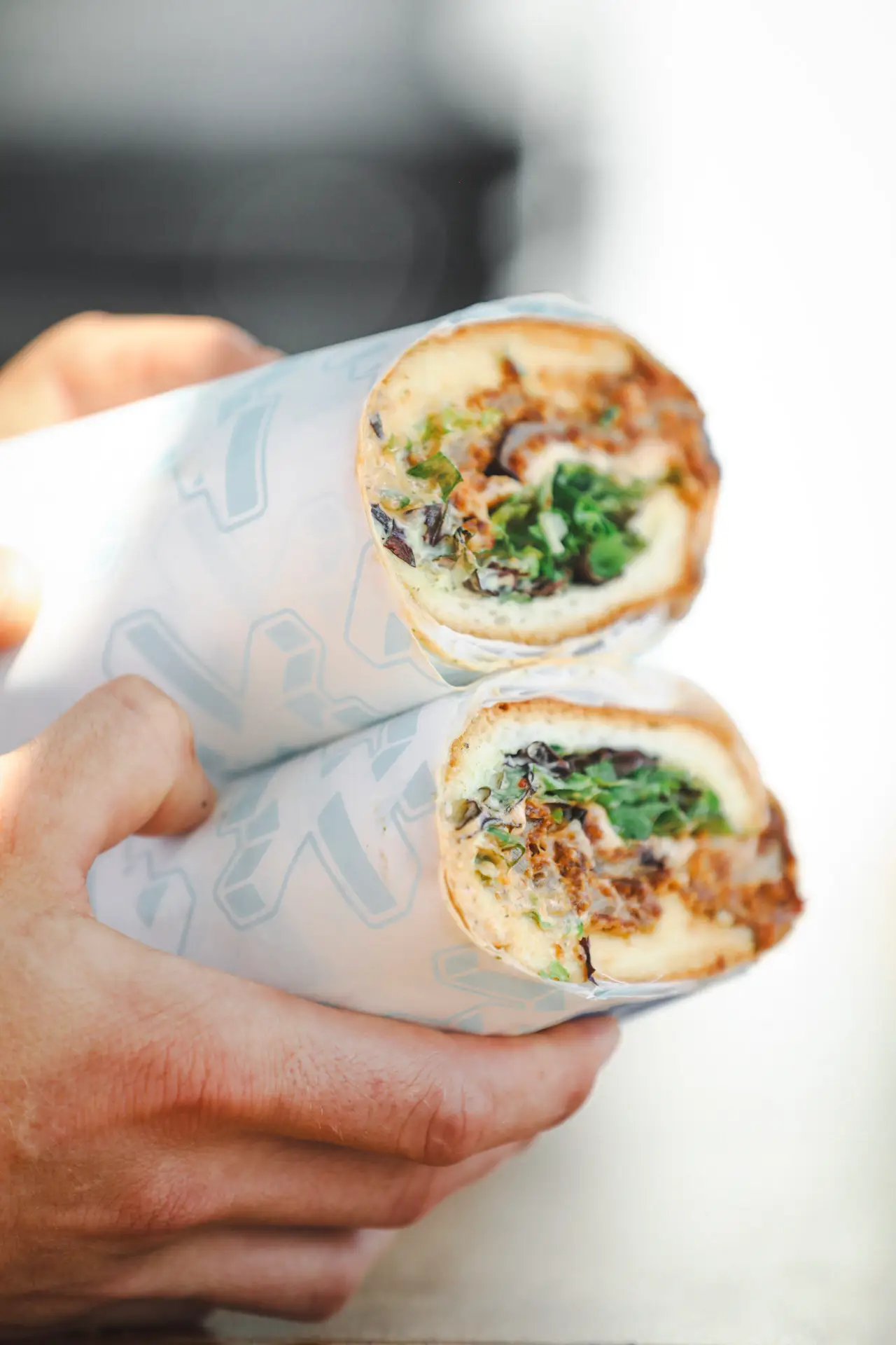 Eggplant Parm: Fried Eggplant, Melted Mozzarella, Vodka Sauce, Hard Times Herb Mix, Basil Pesto Mayo.