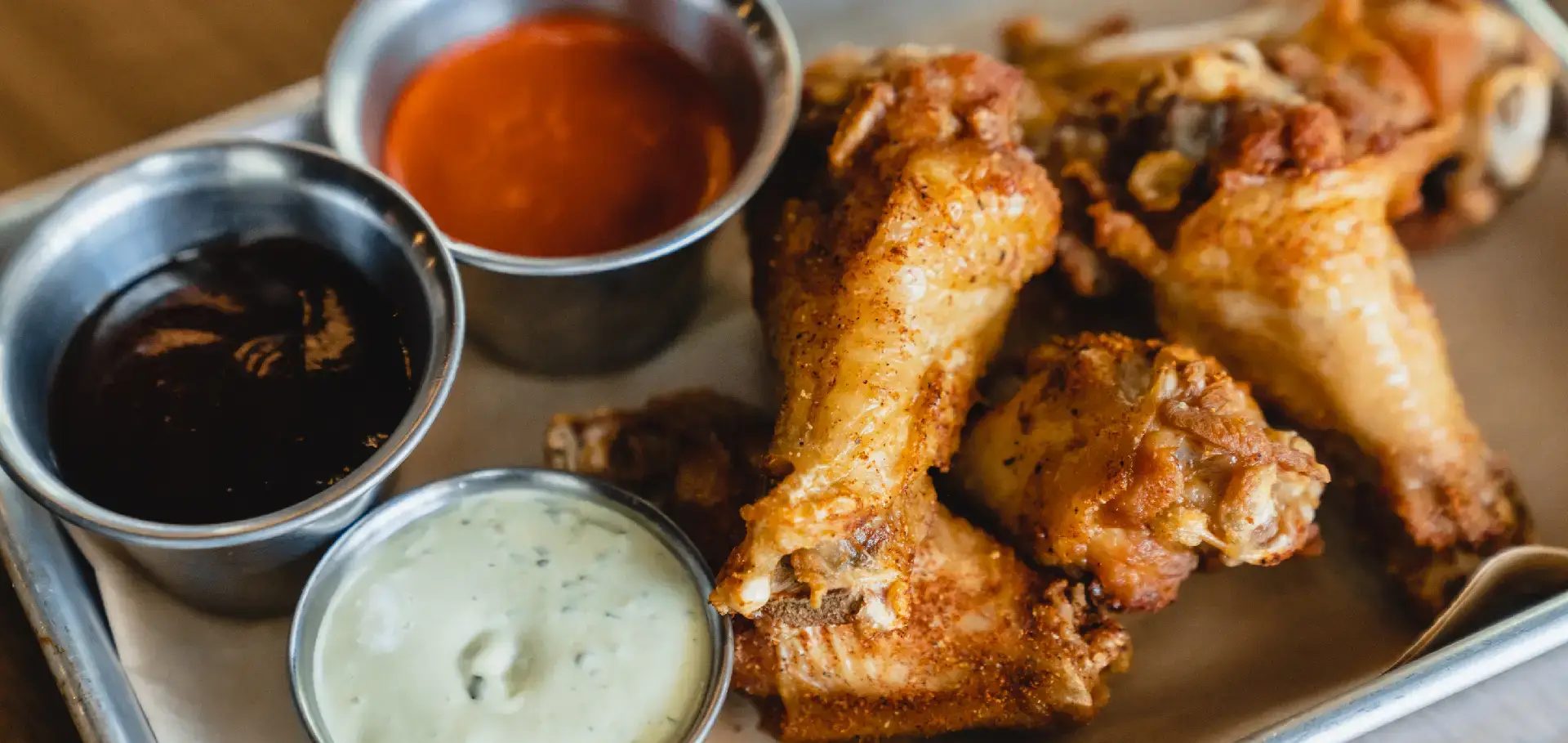 Chicken Wings. Dusted with proprietary spice blend. Dippable Sauces: Buffalo, BBQ, Bleu Cheese, Ranch